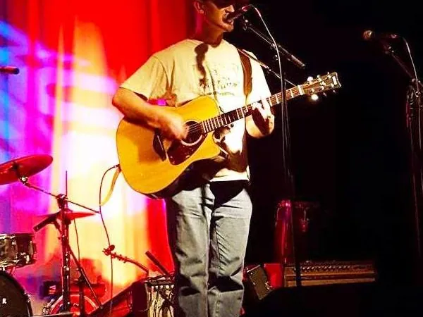 Ryan Conway performing on stage